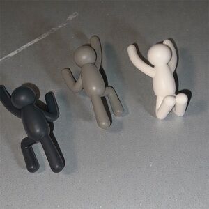 Set of 3 Jumping Figures - Black, Gray, and Cream Hungers